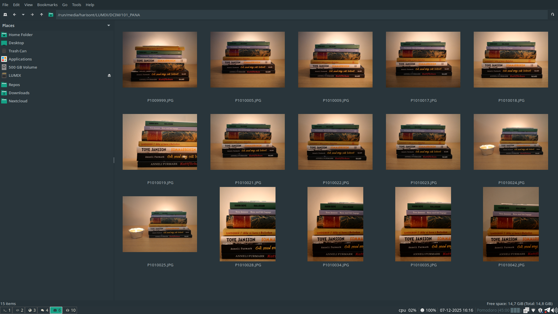 Several attempts at photographing a stack of books in candlelight.