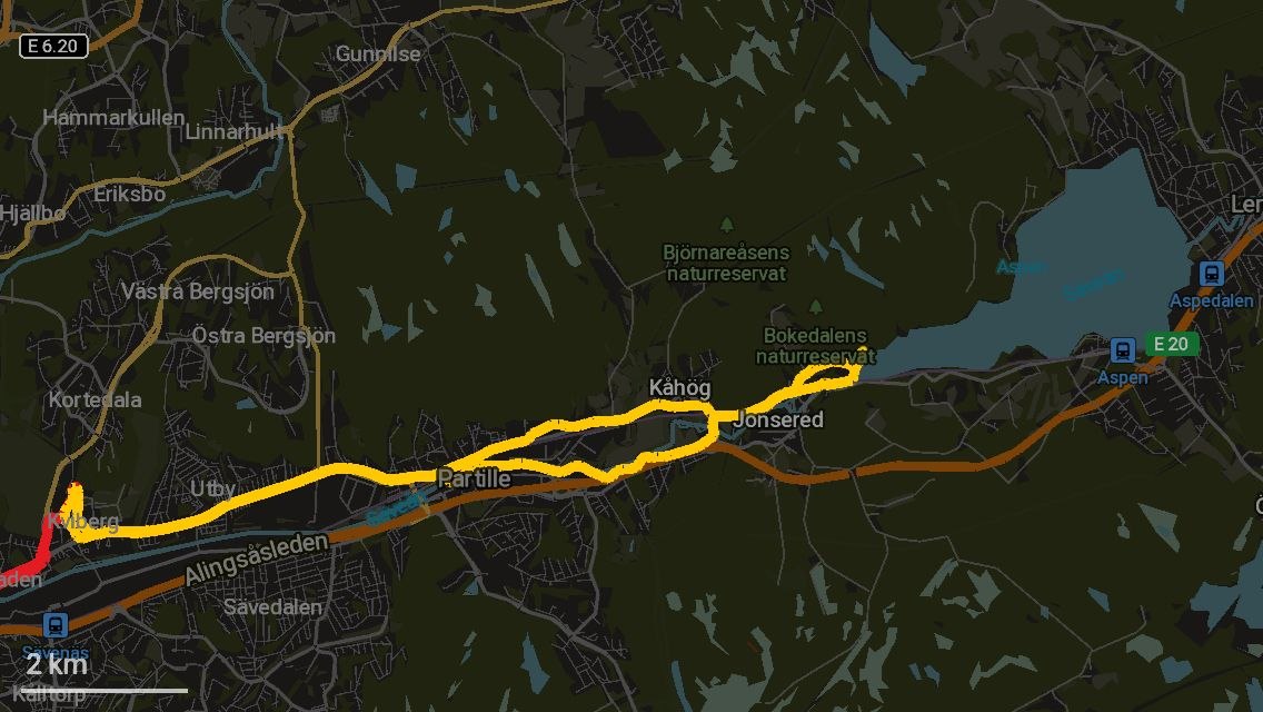 A yellow GPS track in the FOSS app CoMaps. It goes from east Gothenburg to the lake Aspen in Jonsered and back, taking slightly different routes